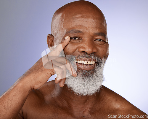 Image of Face, skincare or senior man in studio with a happy smile after cleaning or detox with beauty cosmetics product. Hand, portrait or healthy elderly black man facial grooming routine on mockup space