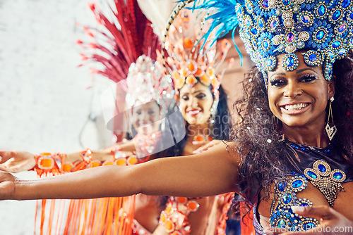 Image of Brazil, dance and carnival with a woman group at a festival during a performance of tradition, culture or heritage. Portrait, event and celebration with female dancers dancing in rio de janeiro