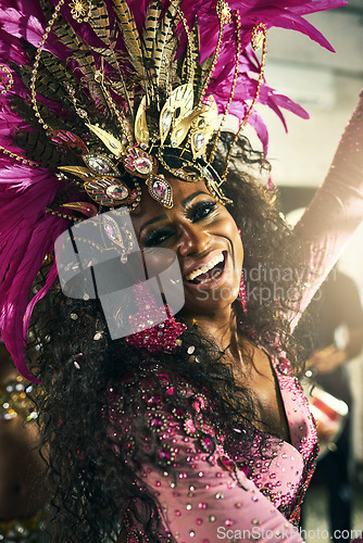 Image of Portrait, brazil and carnival with a black woman dancer in stage costume to perform for tradition or celebration. Dance, festival and culture with a Brazilian female dancing alone at a music event