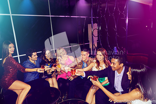 Image of Party, nightclub and friends toast with shots to enjoy celebration, social event and new years in club. Alcohol, cheers and group of men and women celebrate happy hour at rave, disco and cocktail bar