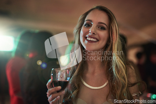 Image of Party, drink and portrait of woman in nightclub having fun at rave, concert and social event with alcohol. Celebration, birthday and happy girl enjoying night with music, crowd and cocktail at disco
