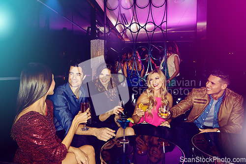 Image of Friends, neon club or party with alcohol drinks, cocktails and toast glass to celebrate birthday, new years and happy hour at VIP lounge. Social, celebration and nightclub with men and women cheers