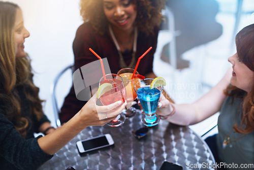 Image of Friends with cocktail, toast at club for happy hour, women together for celebration and ladies night with event and alcohol drinks. Happy, fun and female group having cocktails with social gathering.