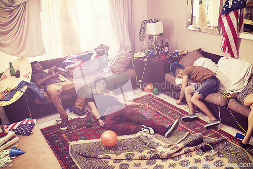 Image of Party, drunk and hangover with man friends sleeping on a sofa in the living room of a home after celebration. Drinking, hungover and alcohol with a male group after a birthday or new year event