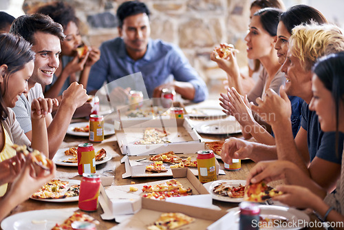 Image of Friends together eating, pizza at restaurant and fast food on table with social gathering and happiness in group. Men, women have lunch party with food, soda and nutrition, meal in New York pizzeria.