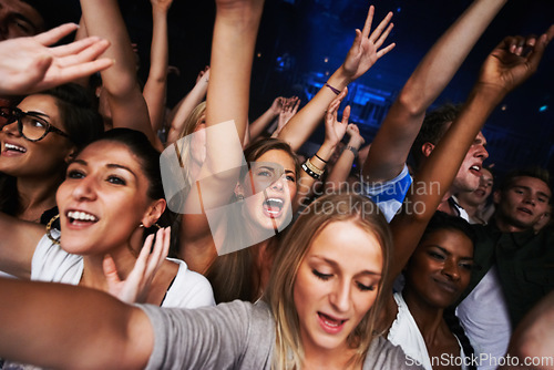 Image of Crowd, concert selfie and music festival with fans having fun, audience cheers for live band performance in Los Angeles. Music, energy and entertainment with excited picture and festival for new year