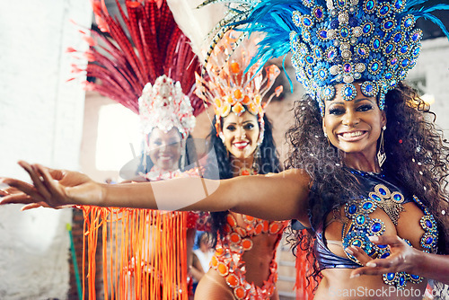 Image of Brazilian women, group or carnival dancers in performance practice, festival dance or Rio de Janeiro party. Portrait, happy smile or samba girls in fashion clothes, sequence bras or feather headdress