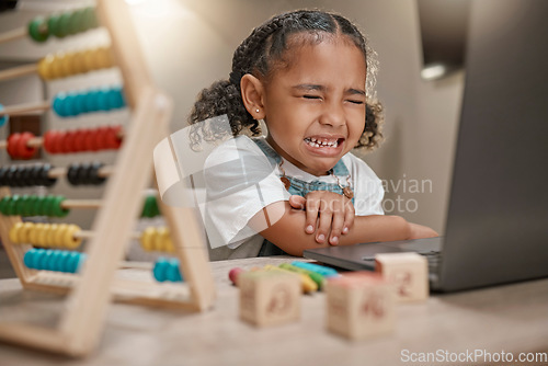 Image of Girl, sad and crying with laptop and abacus, math and homework with elearning, online and education in house. Young child, frustrated and struggling with mathematics, fail and problem with learning