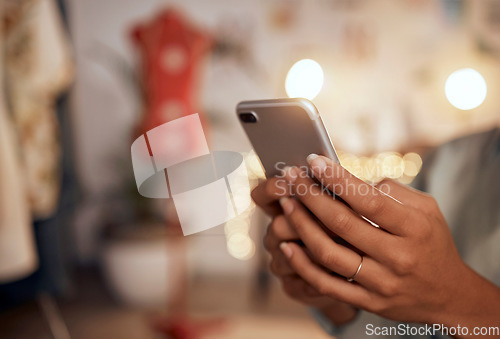 Image of Hand, phone and woman using wifi to browse the internet for online shopping or e-commerce closeup. Zoom, hands and female scrolling social media for meme or media content on a mobile app