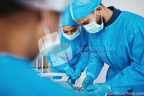 Image of Surgery, medical operation and doctors with patient in emergency room at hospital, medic center or clinic. Healthcare, collaboration and team of surgeons working with surgical tools in operating room