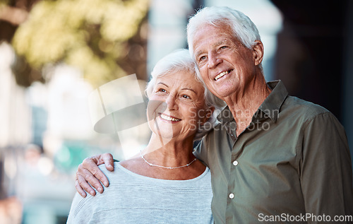 Image of Senior couple, enjoy view and hug at home while enjoying retirement in summer with love. Loving, caring mature man and woman in retirement home with a romantic embrace outdoors in happy marriage