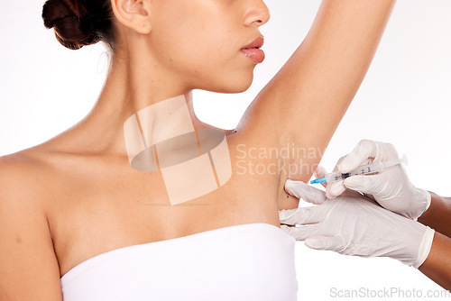 Image of Beauty, armpit and injection for wellness aesthetic and professional treatment of hyperhidrosis. Plastic surgery doctor with cosmetic under arm botox syringe for girl patient in white studio.