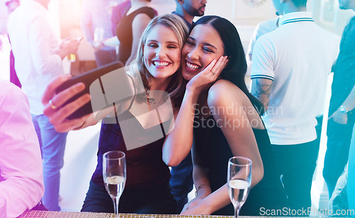 Image of Friends, selfie and wine with women at party for new year celebration, birthday and cocktail event. Social, happy hour and phone with girls and drinks at night club for disco, energy and music event