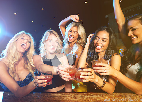 Image of Friends, party in nightclub with cocktail and toast drink, fun and happiness with women at new year celebration. Night, excited with alcohol cocktails and cheers with energy, dance and drinks.