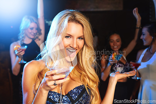 Image of Party, alcohol and woman at nightclub for dancing, drinks and celebration of birthday, happy hour or new years with cocktail while excited at night. Happy female model with energy, fashion and smile