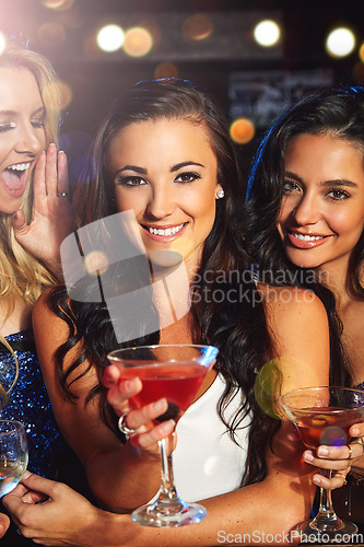 Image of Women, cocktail drink and party with smile in portrait, friends on night out for new year celebration in nightclub. Alcohol, drinking glasses and happy with cocktails, happy hour and ladies night.