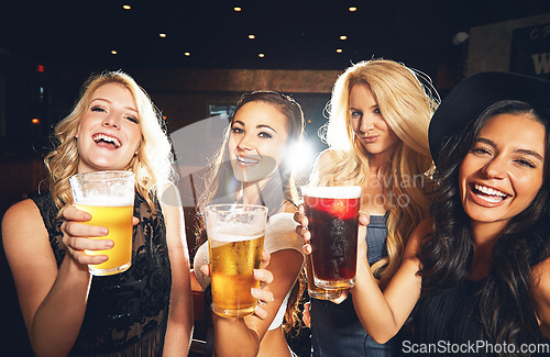 Image of Portrait of women, nightclub and party with drinks for celebration, new years evening and happy hour event. Happy friends, girls and social drinking in night club, pub and cheers with alcohol beer