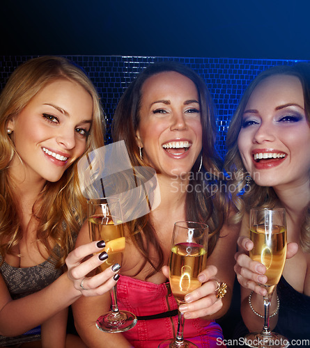 Image of Champagne, women and friends smile in portrait in nightclub, new year party celebration and holiday happy hour. Happy people with alcohol drinks, celebrate and get drunk with social event and club.