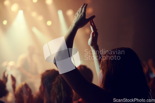 Image of Music festival, audience or woman dance in crowd for disco, celebration or freedom with energy, club event or party. Concert or girl for dance with hands for support, celebrate new year or birthday