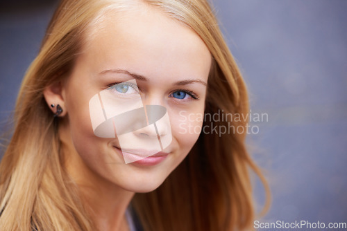 Image of Beauty, happiness and portrait of woman with smile for wellness, positive mindset and relaxing. Youth, cosmetics and face of young teenager from Ireland with healthy skin, blonde hair and blue eyes