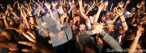 Image of Music, dance and party with crowd at concert for rock, live band performance or festival. New year, energy and disco with audience of fans listening at celebration for techno, rave or nightclub event