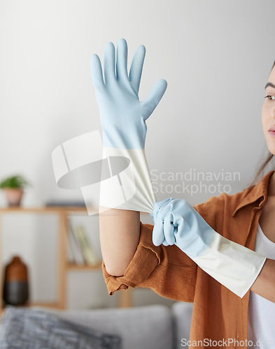 Image of Woman, hand gloves and prepare to start cleaning, hygiene and housework in clean service, work and job in house. Female domestic worker, bacteria and cleaning service, zoom and cleaner in home