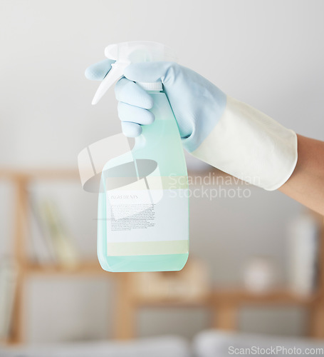 Image of Cleaning, spray bottle and hands of woman in home for bacteria, safety and sanitary. Hygiene, chemicals and housekeeping service with cleaner and disinfection product for germs, dirt and domestic