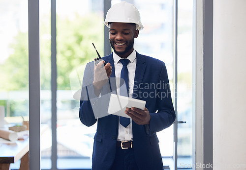 Image of Black man, tablet and walkie talkie in construction management, office building schedule or architecture planning. Smile, happy and engineering worker with digital technology or communication device