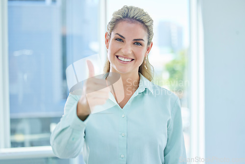 Image of Woman, thumbs up or success in modern office, real estate company or property development startup and innovation, goals or Canada ideas. Portrait, smile or happy mortgage agent and trust hand gesture