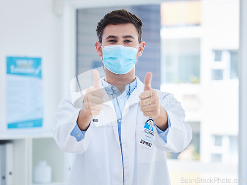 Image of Covid, doctor thumbs up and face mask for medical corona virus healthcare, compliance safety and protection. Covid 19 health care, vaccine medicine and hospital or clinic professional with thank you