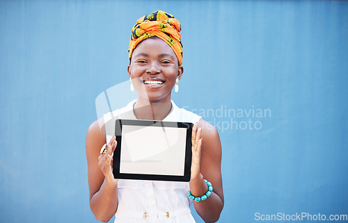 Image of Portrait of black woman, tablet and screen, mockup or web space for digital marketing, advertising or branding app on blue background. Happy girl, digital technology and mock up for product placement