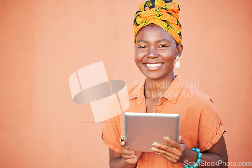 Image of Black woman, tablet and marketing, advertising portrait with technology mockup against orange studio background. Internet, online connection and wifi, 5g network in Nigeria and digital product promo.