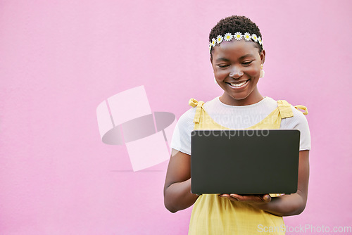 Image of Black woman, laptop and typing to search internet, social media and connection on studio background. Female, Jamaican lady and device for conversation, online reading and relax for planning or mockup