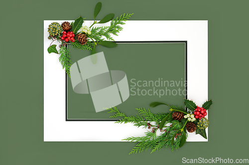 Image of Festive Christmas Background Border with Winter Holly and Flora