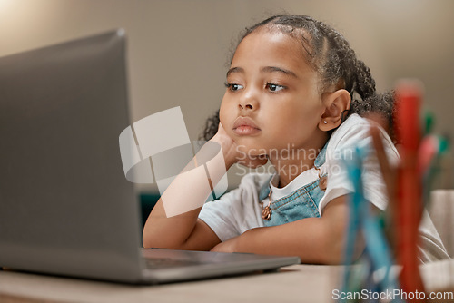 Image of Homework, laptop and bored child distance learning from home looking unhappy with education. Connection, internet and pc for elearning with a little girl attending boring online lesson to study