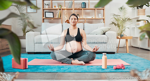 Image of Pregnancy, pregnant woman yoga and wellness meditation exercise for pain relief, mental focus and spiritual zen healing. Indian woman , prenatal pilates and fitness health workout in home living room