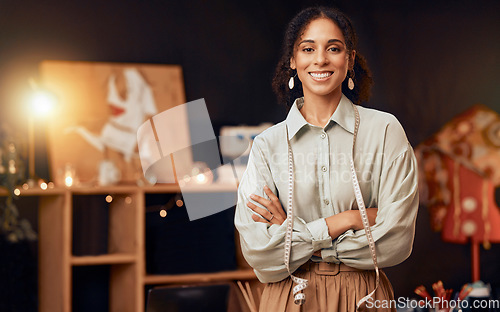 Image of Fashion, designer and black woman at night for small business startup, creative inspiration and manufacturing process portrait. Happy woman, design tape and clothes boutique in dark workspace studio