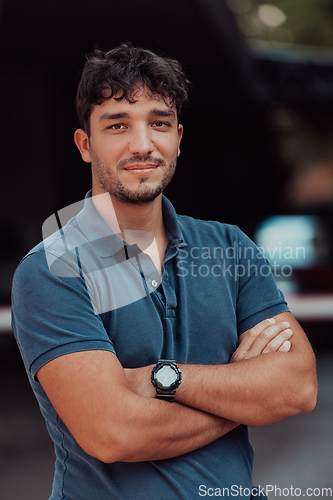 Image of Portrait of a young successful entrepreneur in front of the company