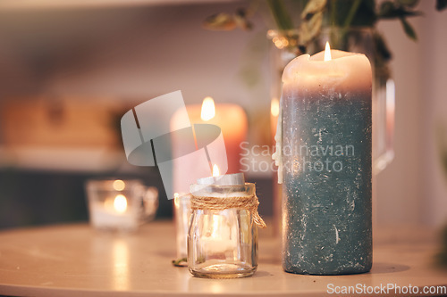 Image of Candles, zen and spa wellness aromatherapy for zen, relax and luxury experience for a massage. Fire, care and physical therapy room with calm, balance and beauty atmosphere in a salon with no people