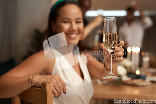 Image of Woman, champagne and hand for toast in portrait, dinner or party for new year with friends, family or team. Happy celebration, sparkling wine or smile at supper for food, drinks or blurred background