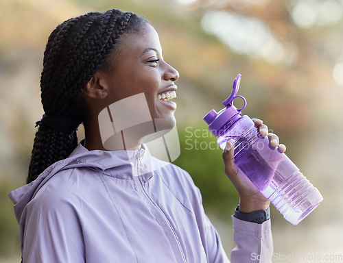 Image of Black woman, water bottle and fitness run outdoor, relaxing and happy smile for healthy and wellness lifestyle in nature. Gen z female, hydrate and drink after exercise, cardio workout and happiness