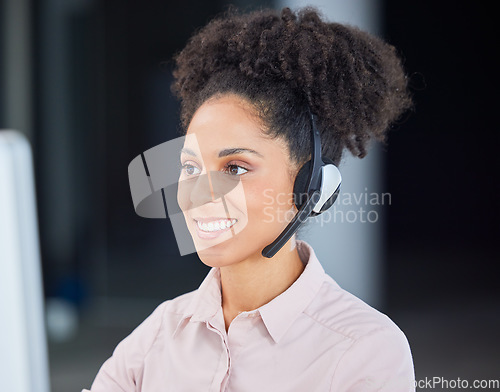 Image of Call center, smile and computer with business woman for customer service, consulting and technical support. Help desk, advisory and telemarketing with black woman and microphone for phone call sales