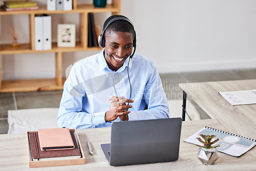 Image of Customer service, call center and video call with black man on laptop in telemarketing office. Video conference, employee and male consultant from Nigeria on computer consulting online in webinar.