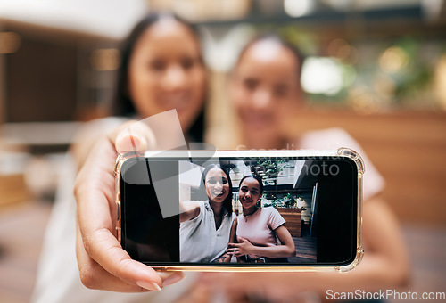 Image of Phone, friends and woman with selfie on screen enjoying shopping, quality time and weekend at the mall. Friendship, social media and happy girls taking picture for memories on holiday on smartphone