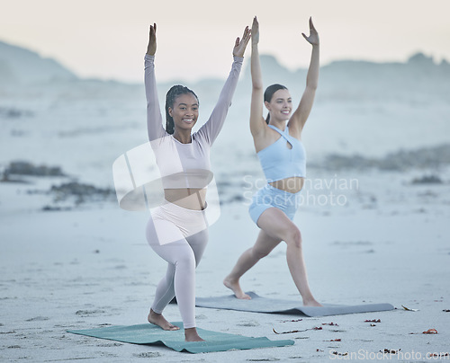 Image of Yoga, fitness and beach with woman friends together on the sand for exercise, mental health and wellness. Nature, diversity and training with a female yogi and friend exercising while bonding outside