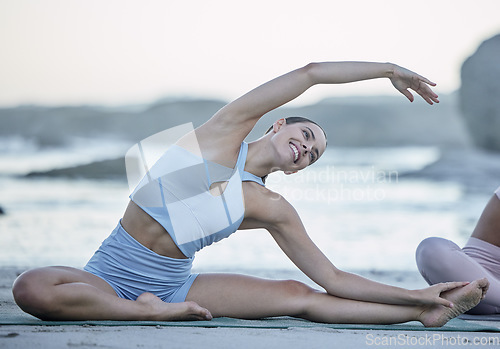 Image of Yoga, beach and wellness woman at class stretching body for fitness and happiness in Hawaii, USA. Health, training and happy yogi girl enjoying workout on ocean sand for wellbeing lifestyle.