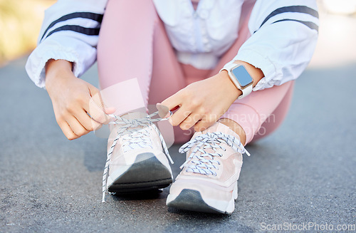 Image of Shoes, lace and woman cardio workout in city street for wellness training, sports running exercise or marathon motivation. Morning run outdoor, healthy lifestyle and sneaker shoelace for fitness
