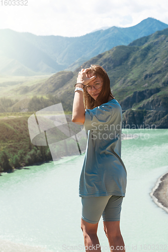 Image of Woman taking selfie on mobile phone