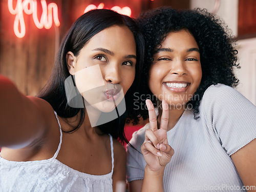 Image of Black women, peace and sign with selfie in cafe, celebrate and party. Friends, girls and females with hand gesture, happy hour and restaurant to relax, happiness or bonding for weekend break or smile