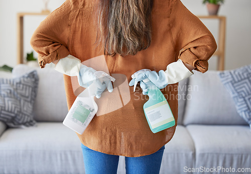 Image of Woman hand, glove and spray bottle, cleaning detergent and spring cleaning in home living room, Cleaner, maintenance and cleaning service with female domestic worker in house, clean and product